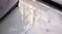 Water on the floor caused by a slab leaks.