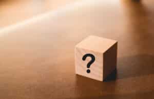 Wooden cube sign question mark symbol, Garbage Disposal Smells.