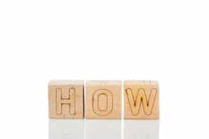 Wooden cubes with letters how on a white background, Hose Bibs.