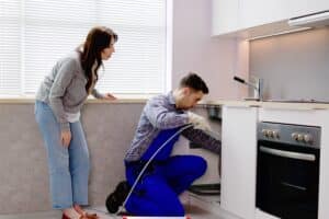 Professional plumbing services, Clogged kitchen sink.