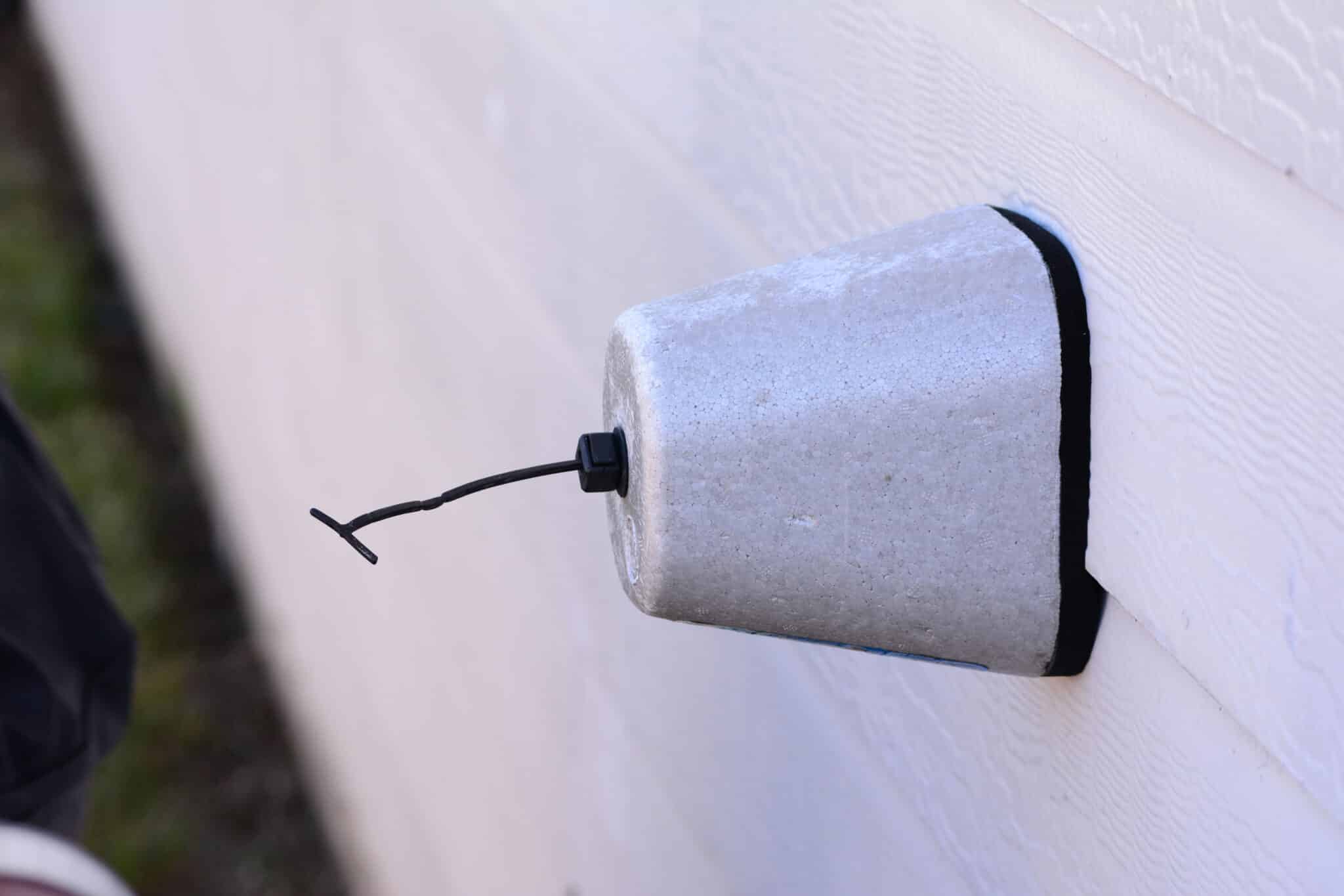 Freeze protection pipe insulation covering faucet, Outdoor Plumbing Damage.