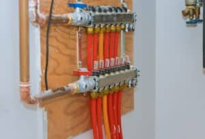 PEX manifold setup for balanced household hot and cold.