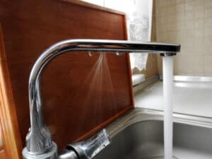 Mystery water usage linked to kitchen faucet damage.