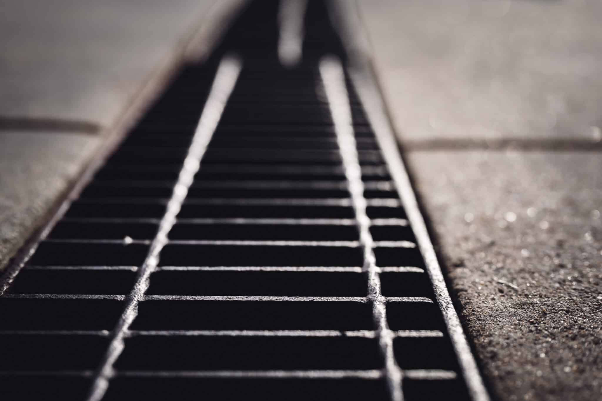 Grates, concrete slab, trench drain install.