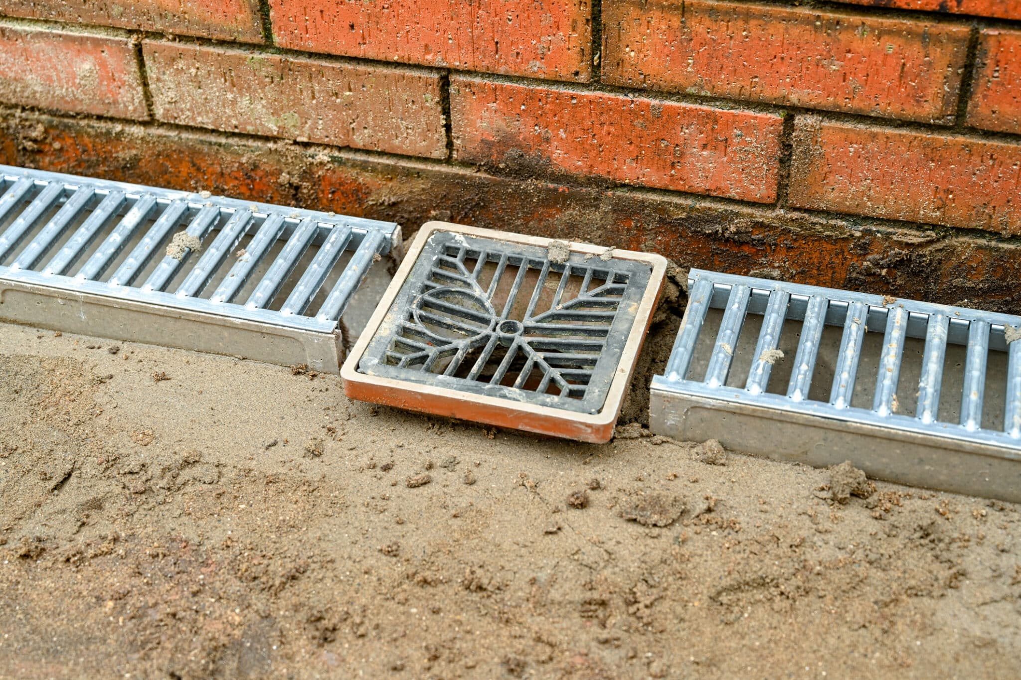 Repair drain and drainage, trench drain install.