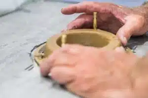 Toilet flange repair that stops rocking and leaks.